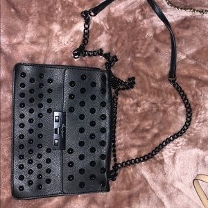 black spiked purse